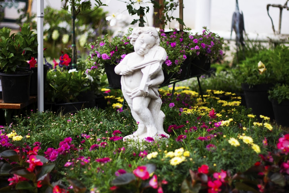 photo of garden décor cherub statue