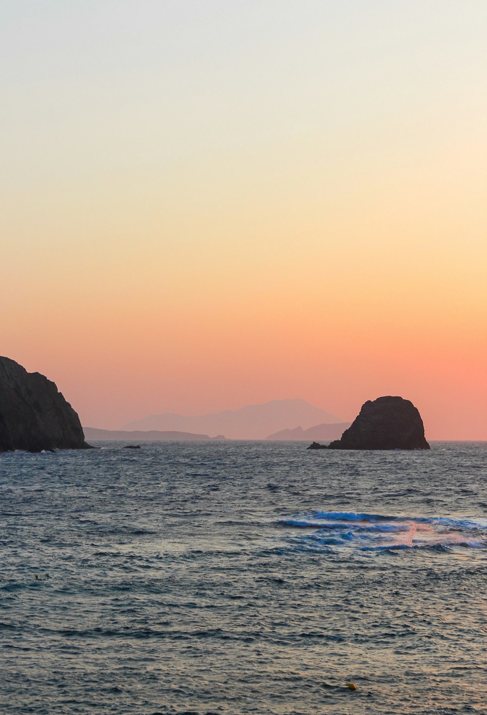 calm sea and rock formations