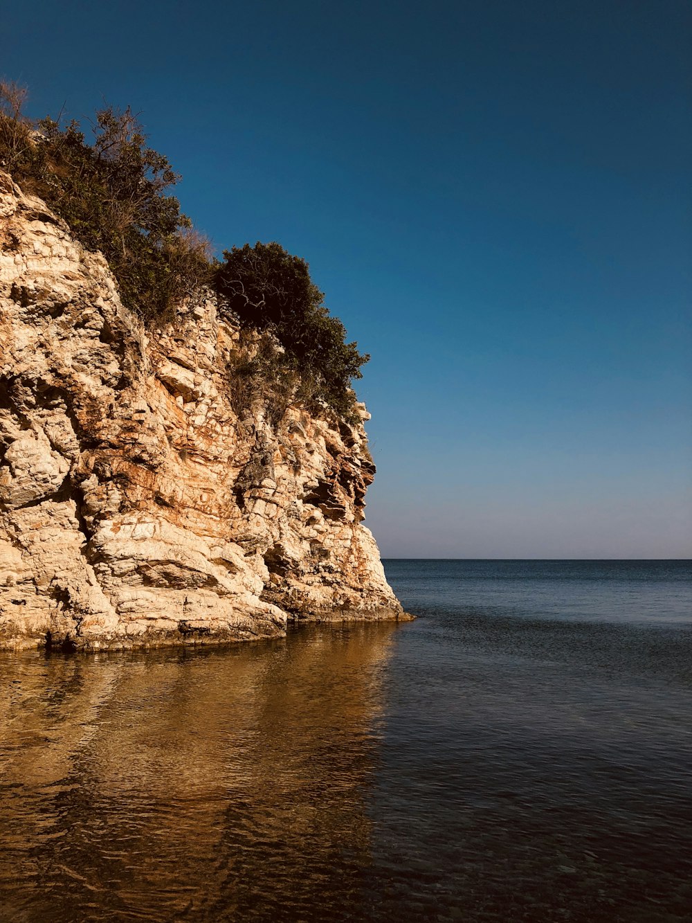 mountain cliff fronting the sea