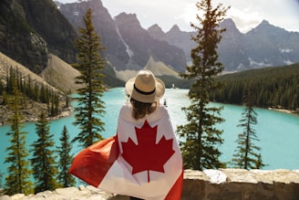 a woman with a canadian flag on her back