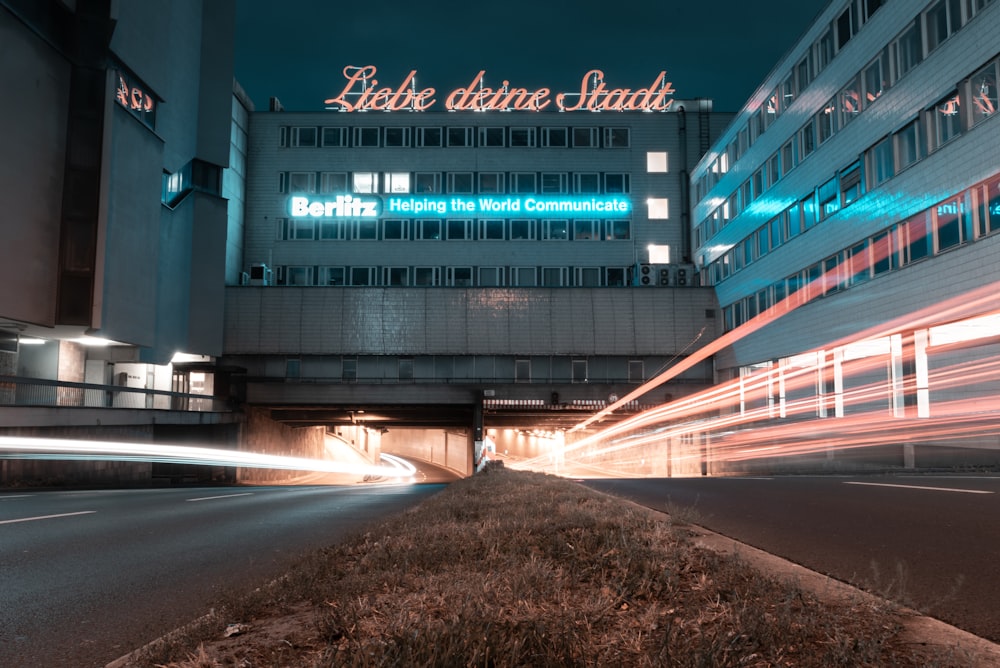 a long exposure photo of a street and a building