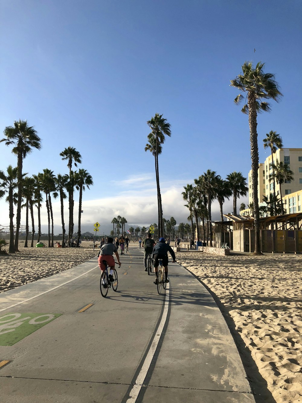 people riding bike on street