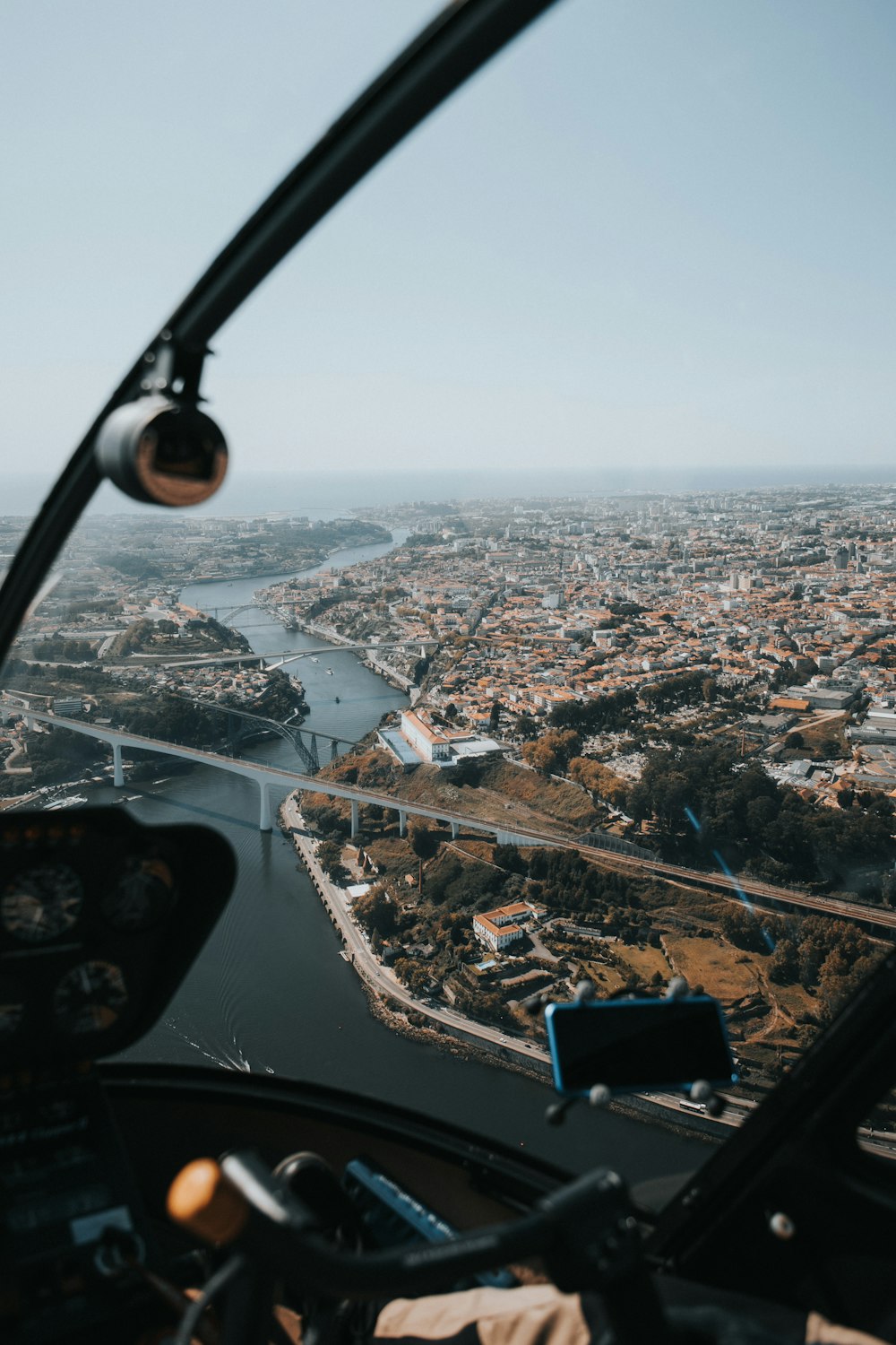 aerial photography of river beside trees and houses