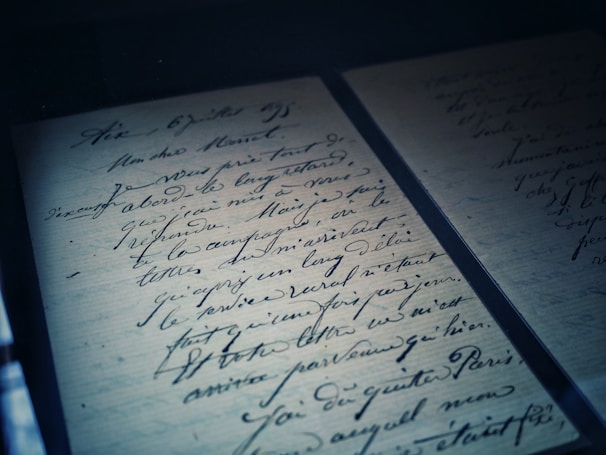 open pad with calligraphy letters