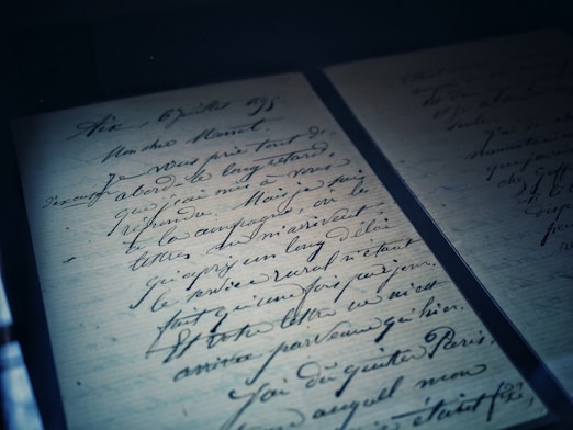 open pad with calligraphy letters