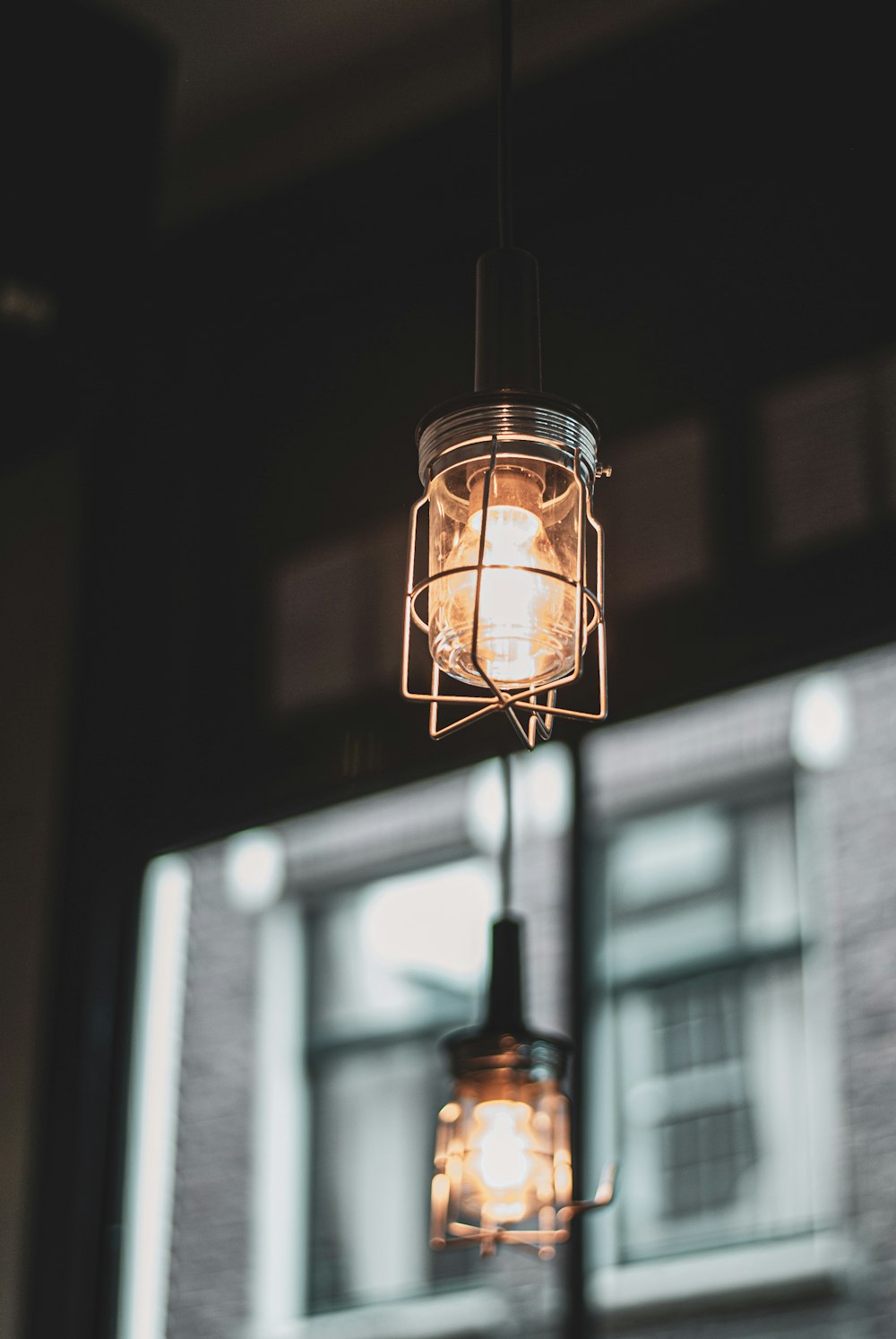 two lighted pendant lamps