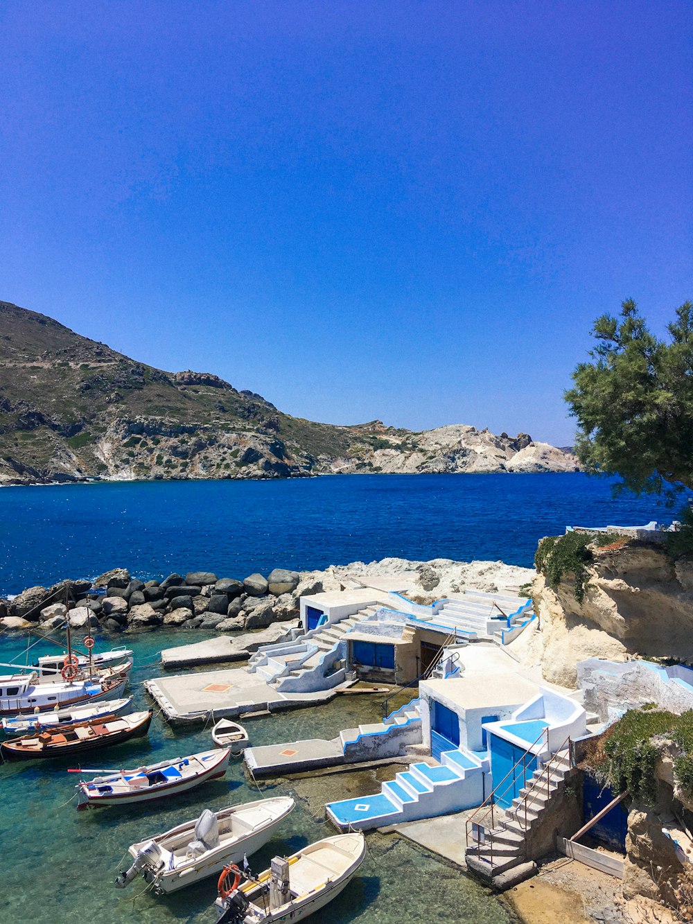 white boats during daytime