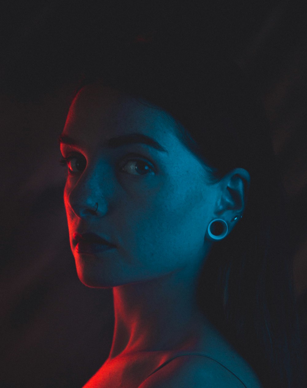 portrait photography of woman looking to the side