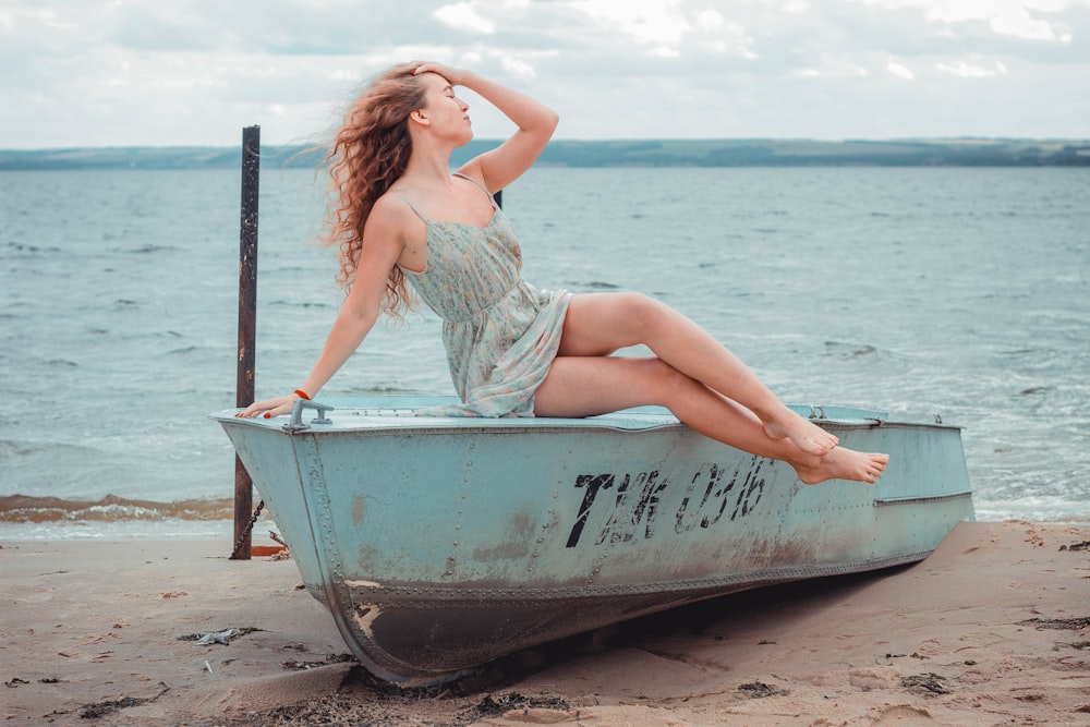 woman sitting on boat