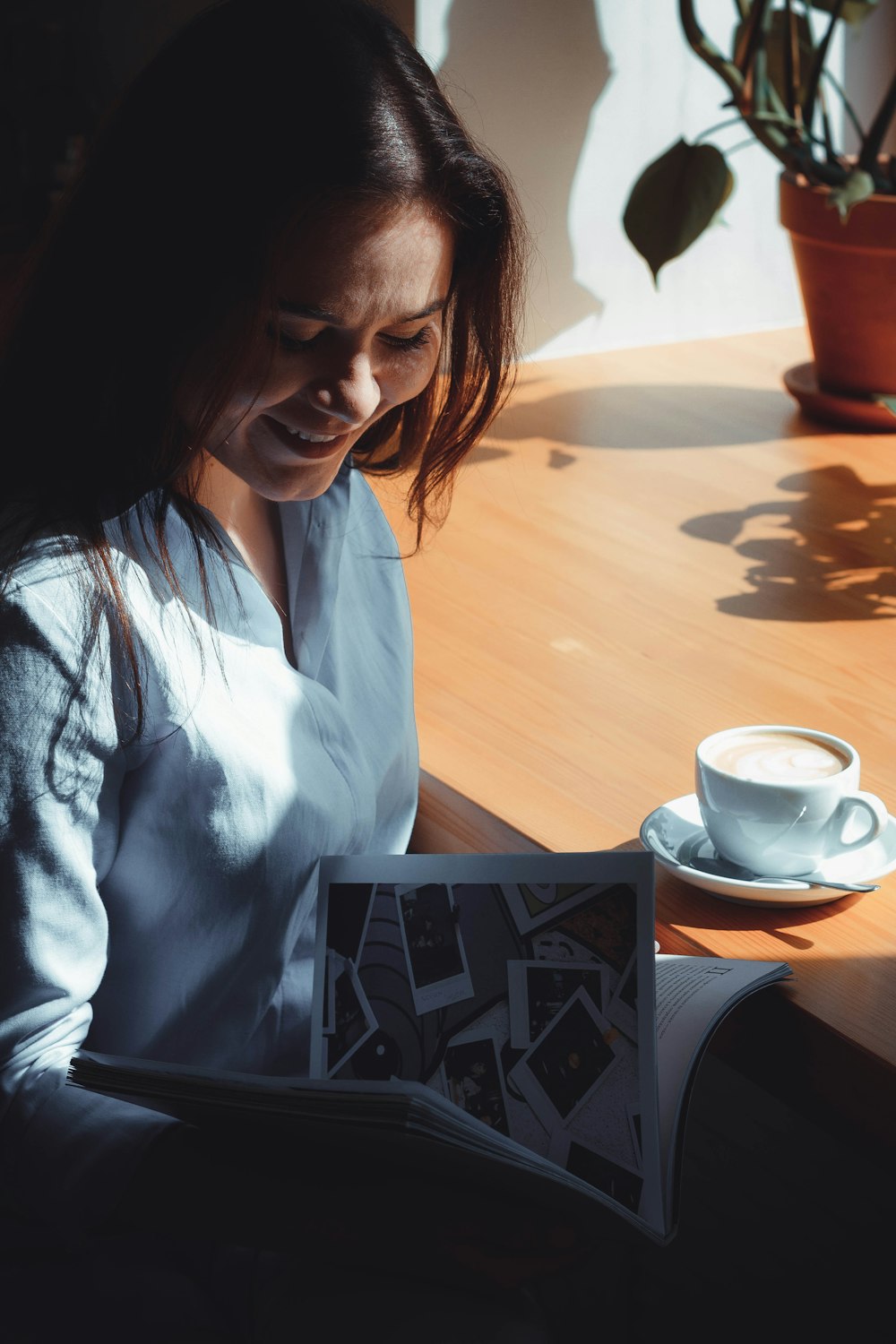 woman sitting near table