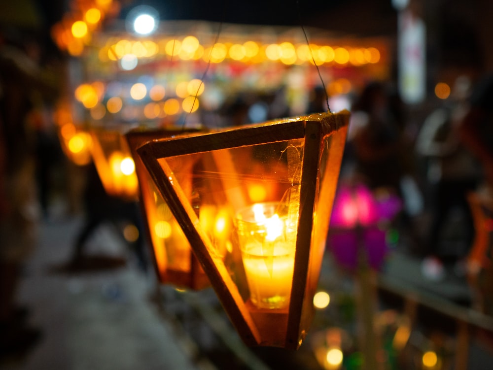 shallow focus photo of lighted lamp