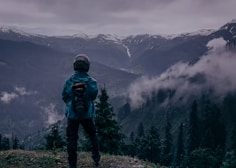 man standing near tree