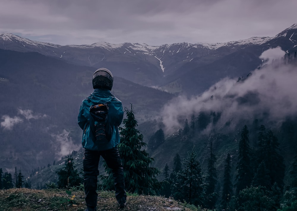 man standing near tree