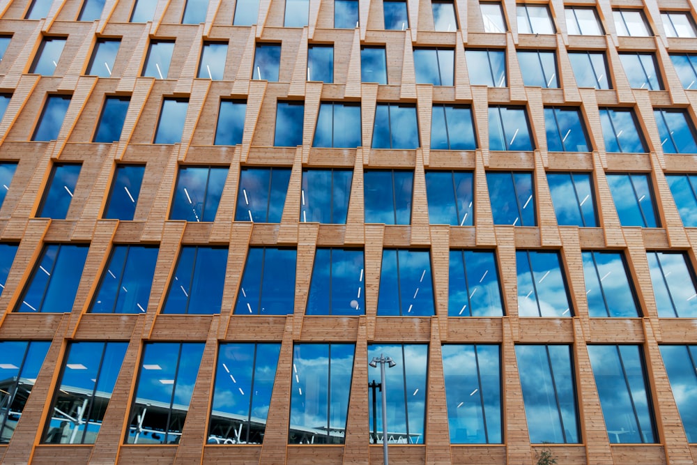 brown glass window building during daytime