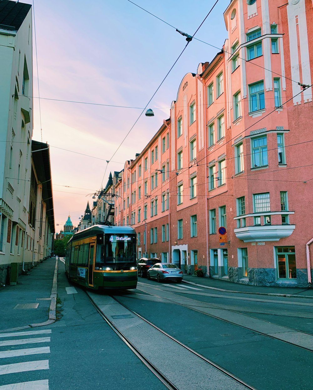 tram train running on road