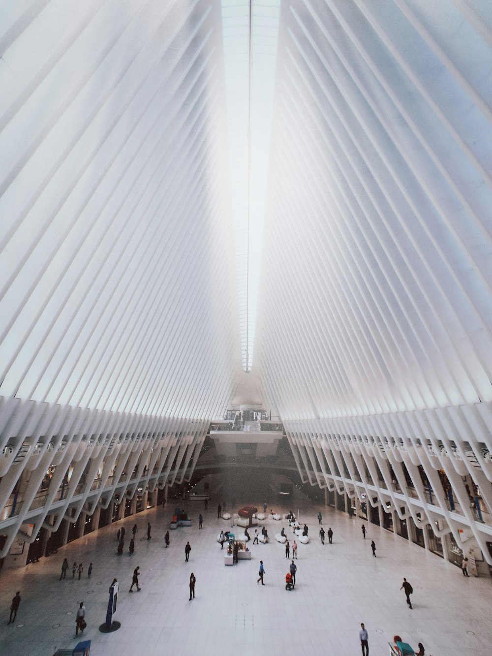 people standing inside building interior