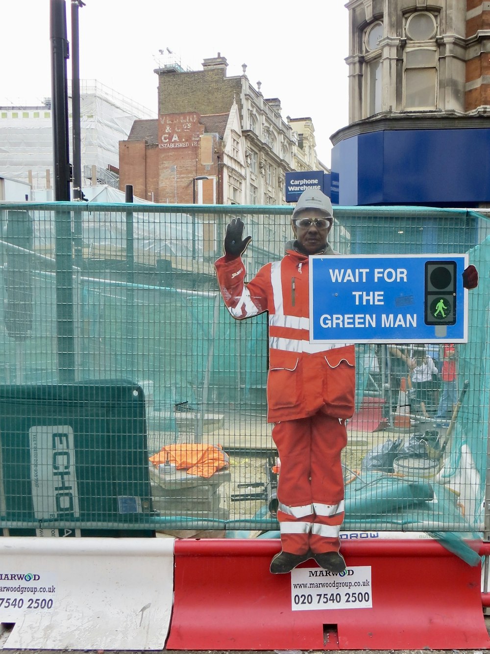 man near fence