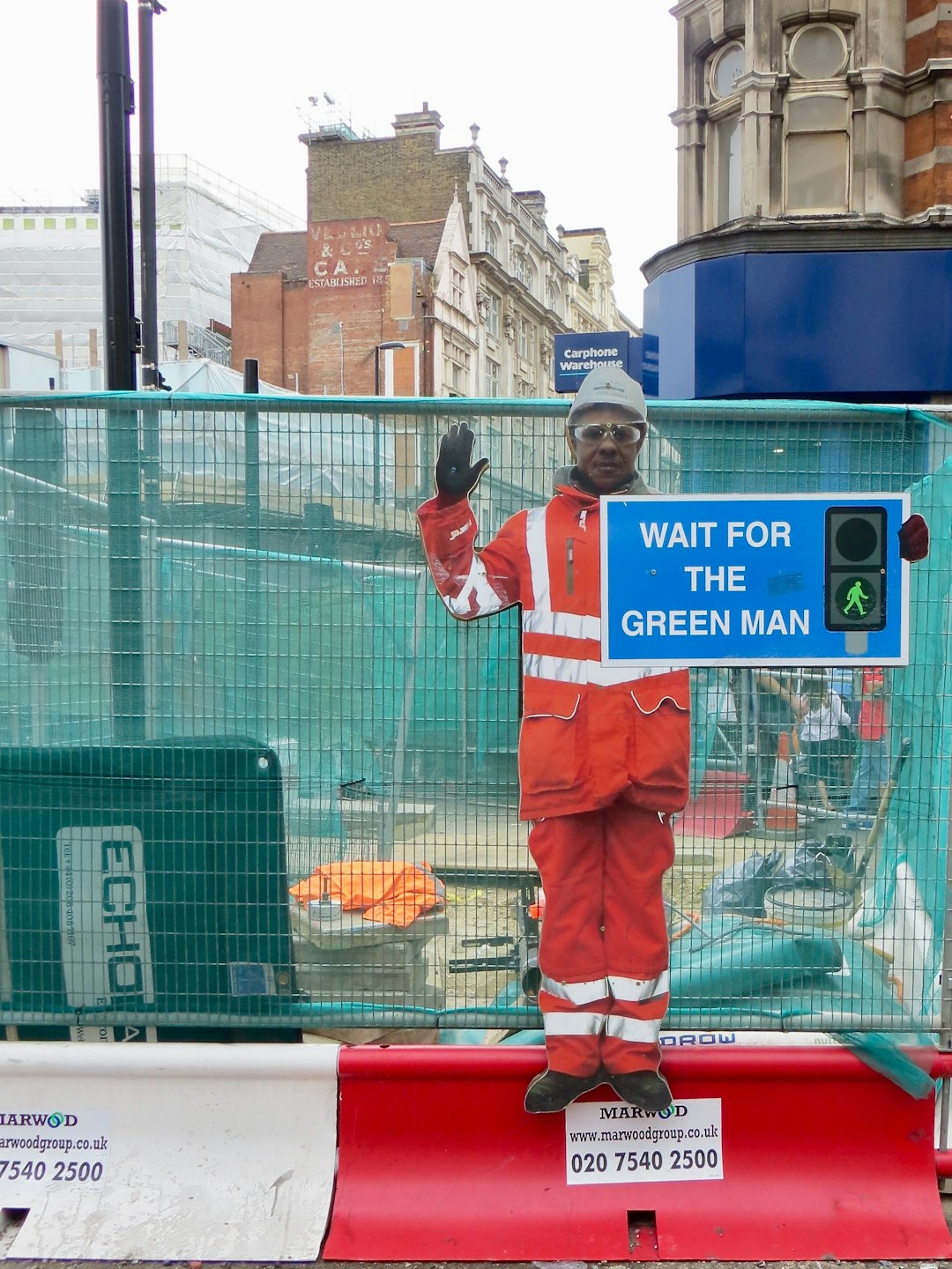 man near fence