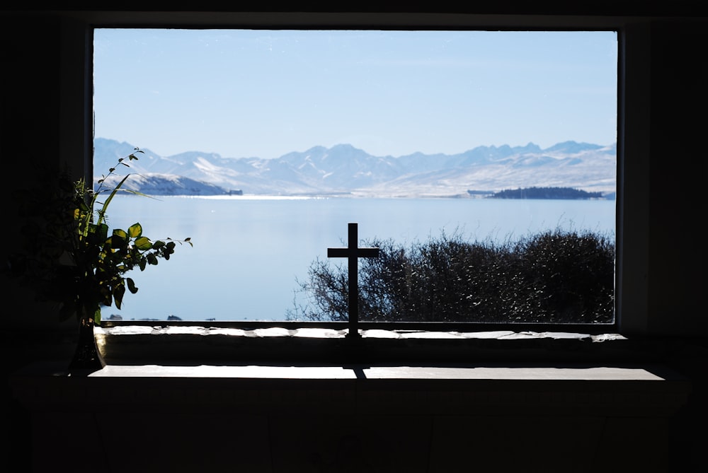 silhouette photography of cross