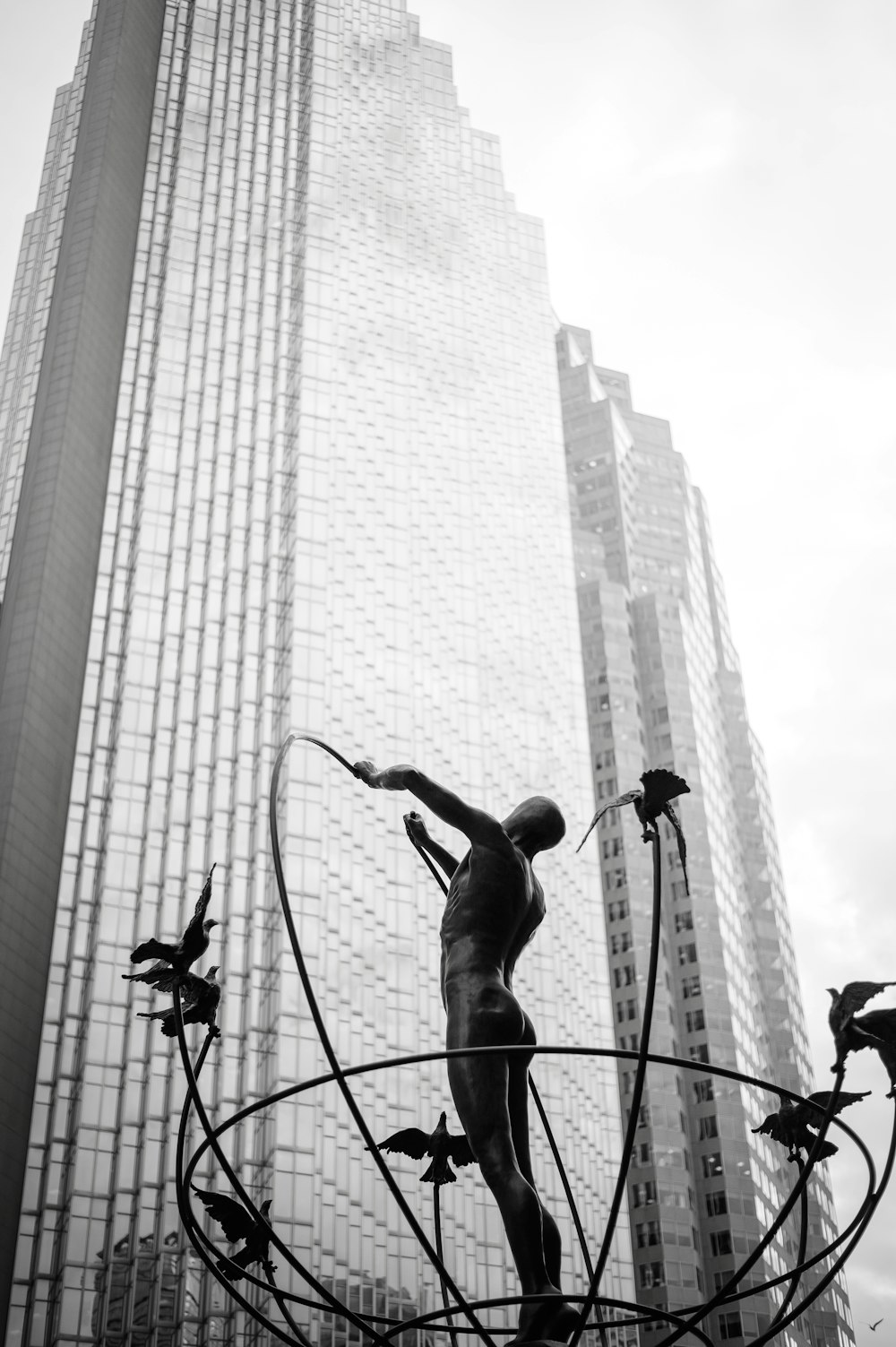 man statue near building