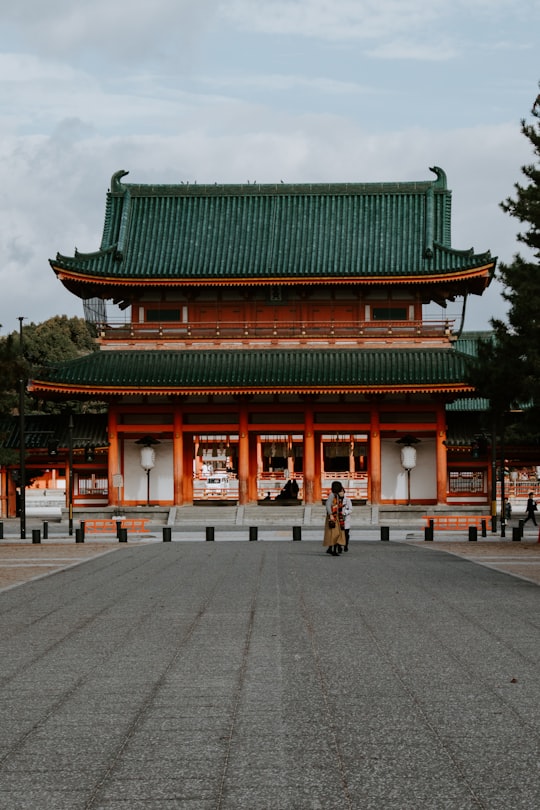 green and brown building in Heian Shrine Japan