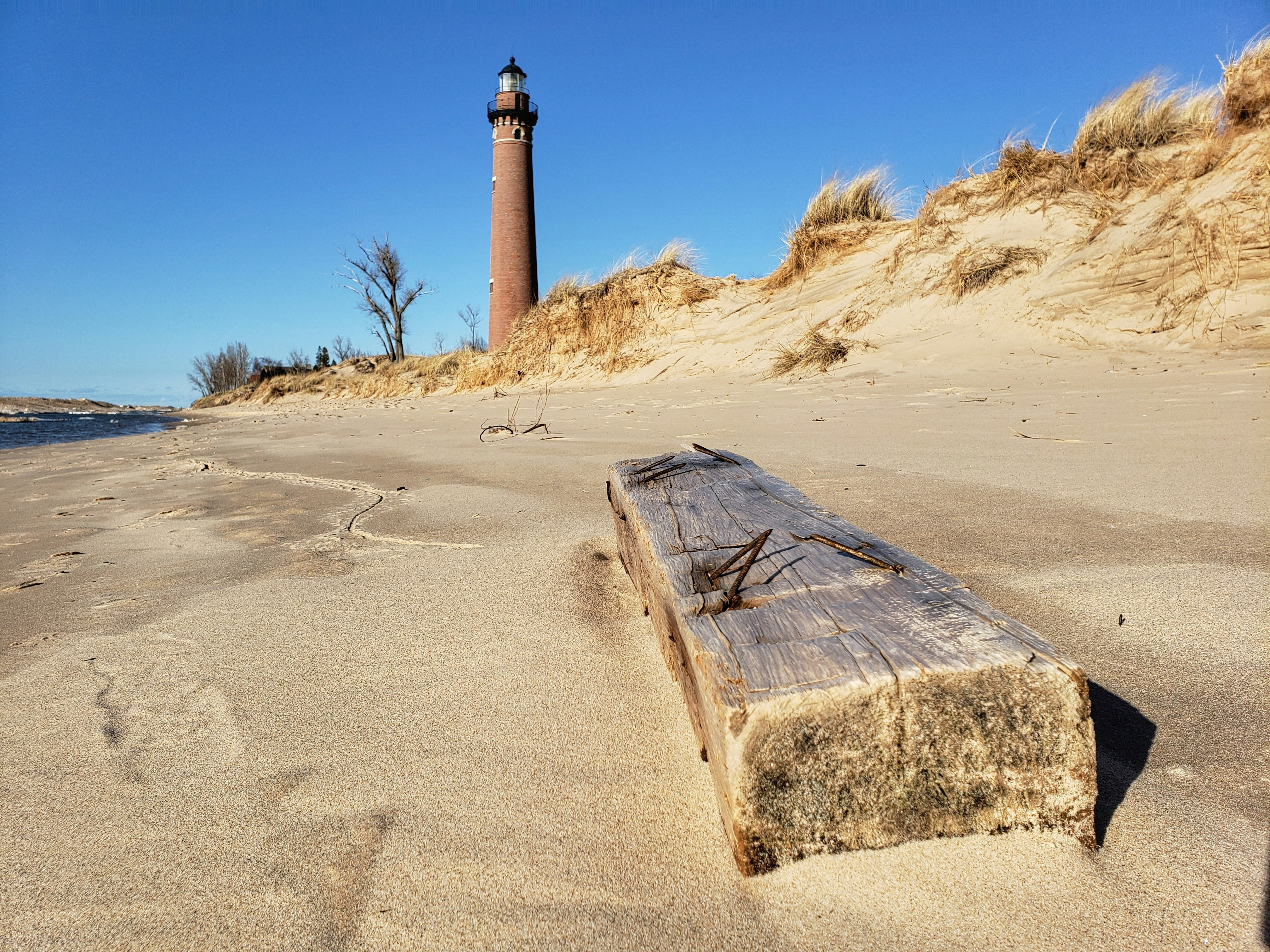 Lighthouse on beach. 