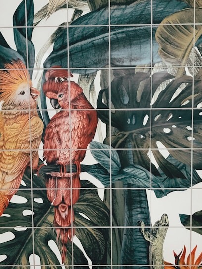 A vibrant 3D nature mural printed on a living room wall, showcasing detailed leaves and flowers with a textured finish.