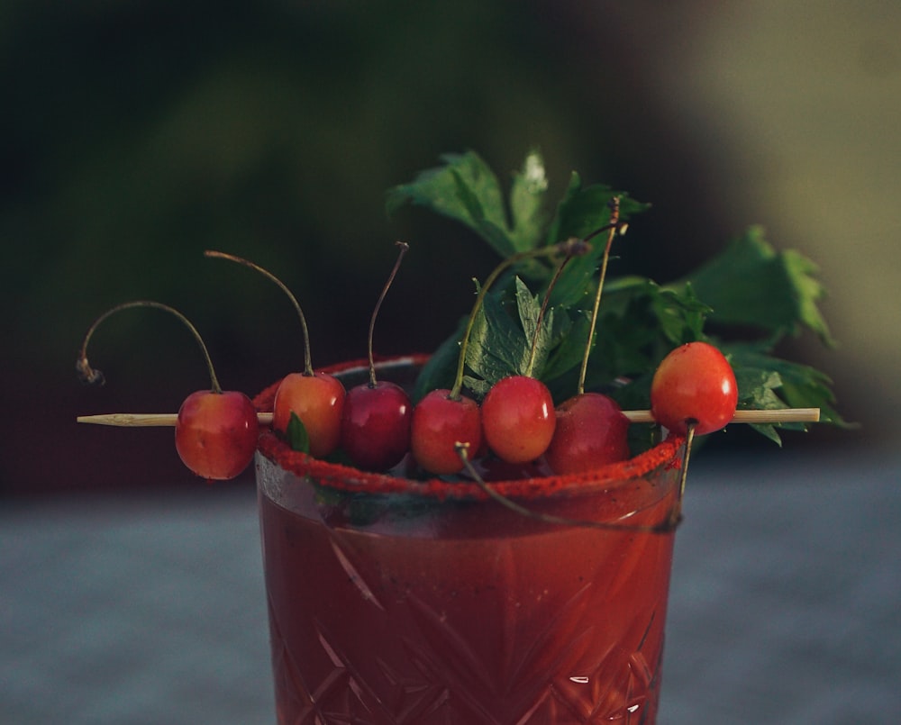shallow focus photography of cherry juice