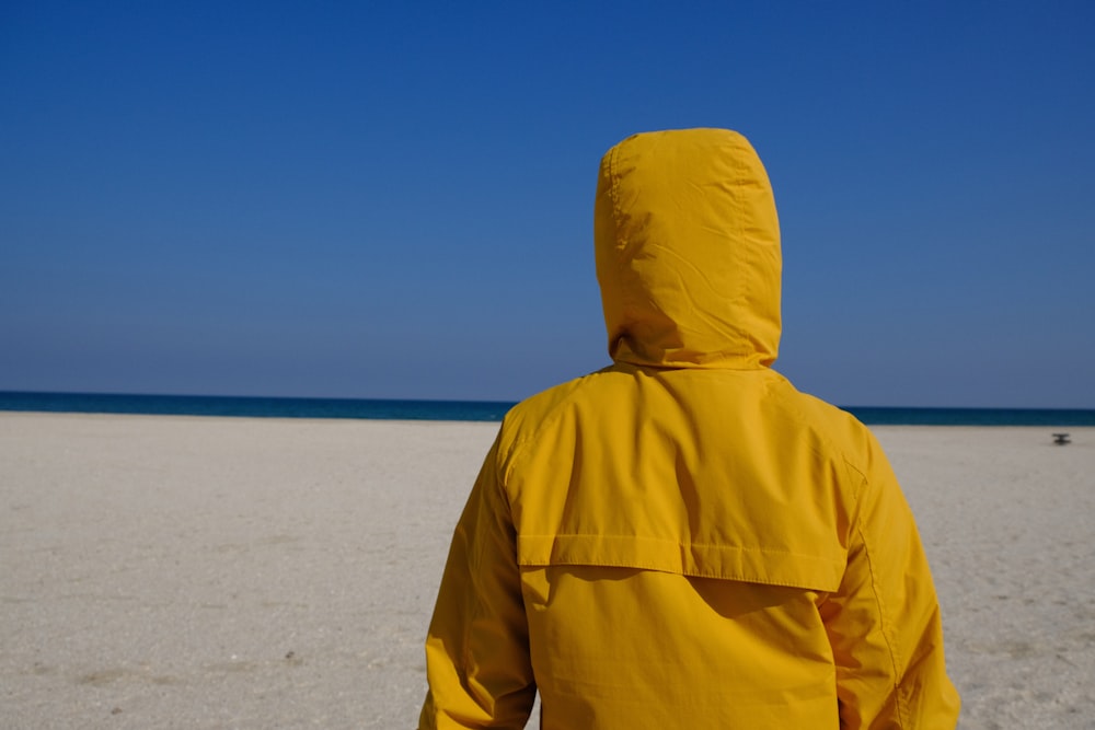 person in yellow hoodie