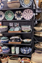 Close-up of colorful household goods displayed invitingly on shelves.