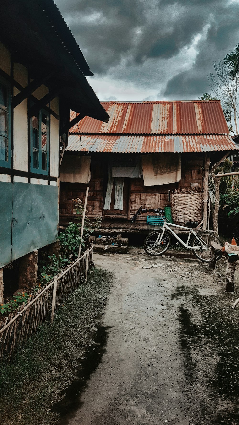 white bike outside house