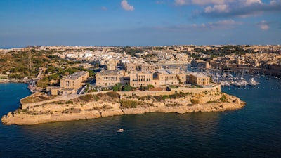 brown concrete building malta zoom background