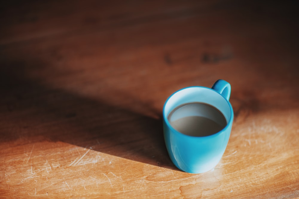 filled blue ceramic mug
