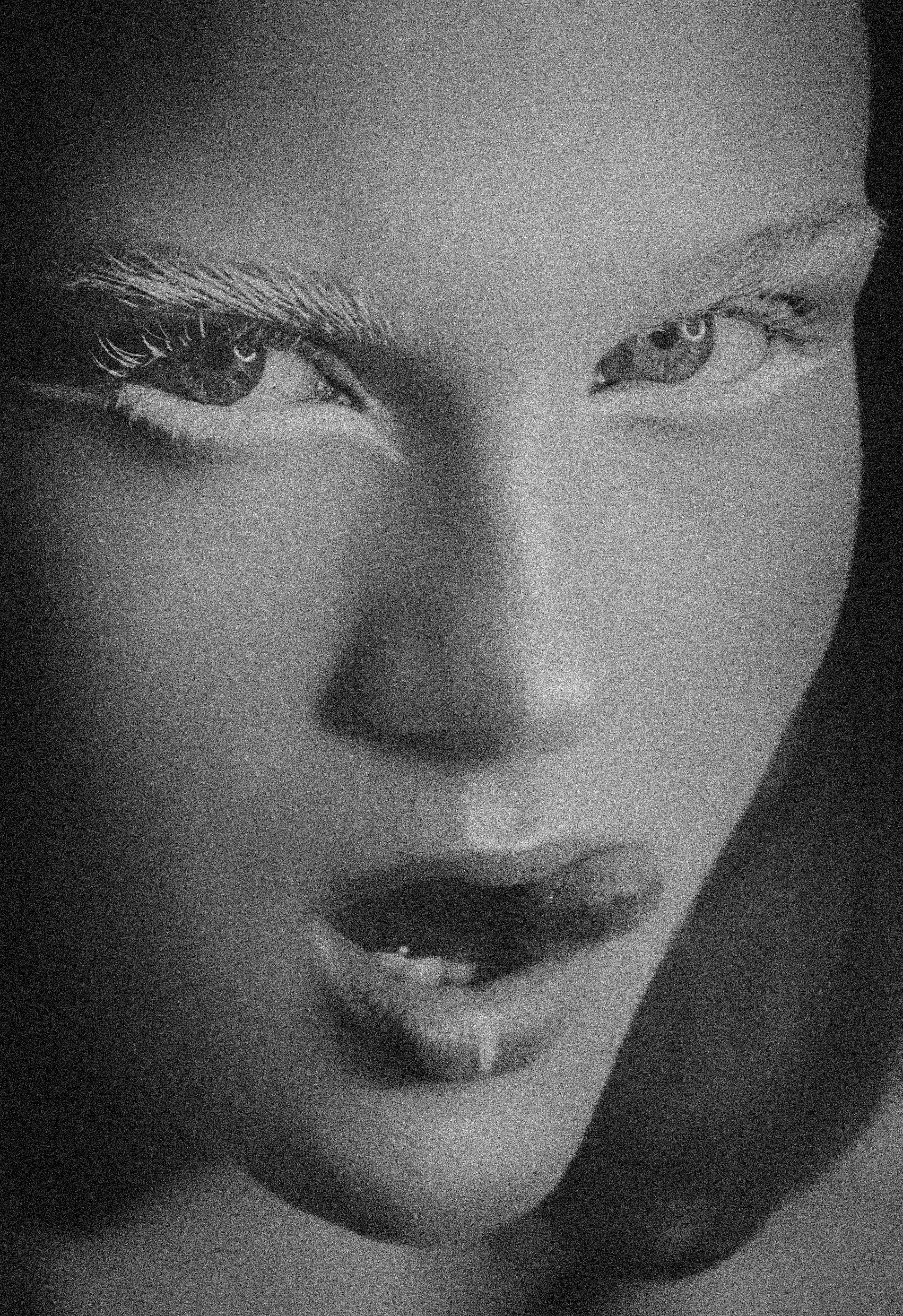 grayscale photography of woman's face