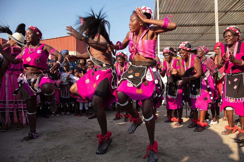 close-up photography of people dancing on street