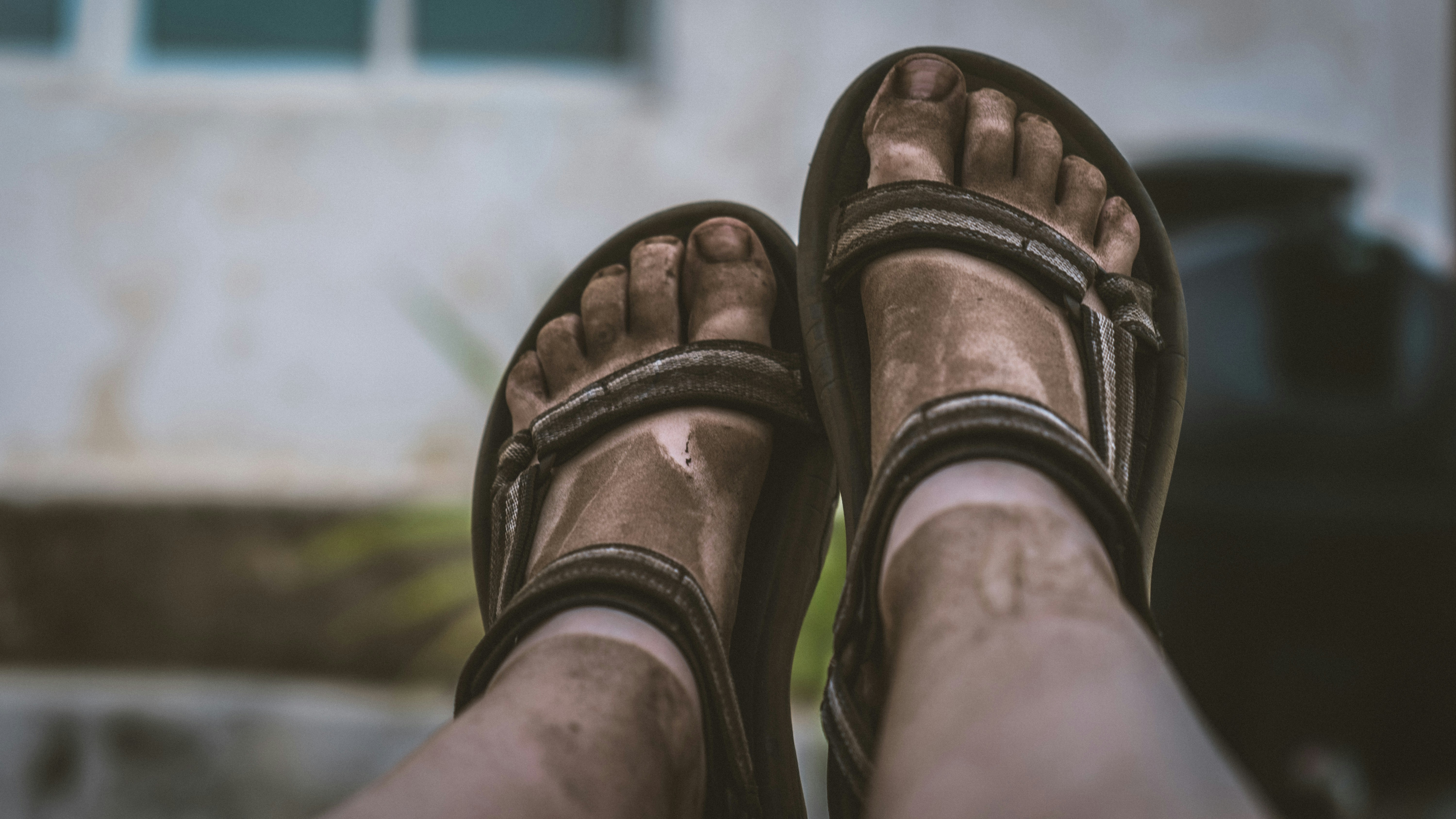 Dirty feet after a stroll on a black sand beach on Fogo, Cape Verde.