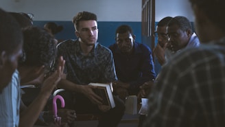 men sitting inside room