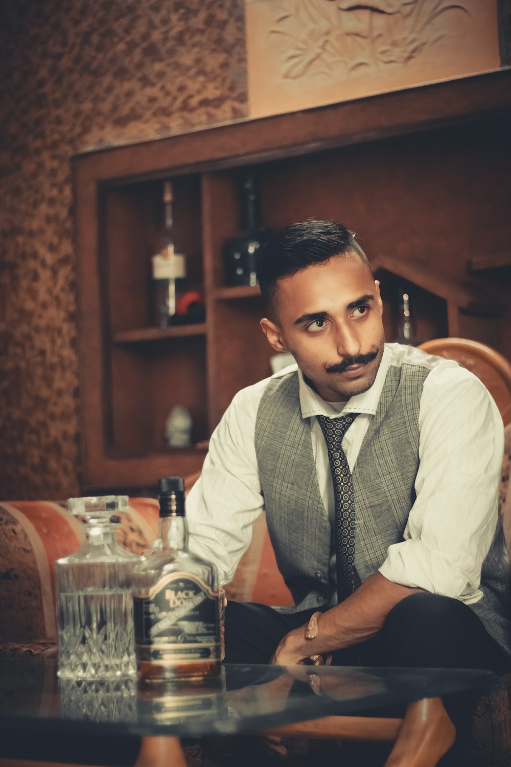 man wearing white and gray dress shirt