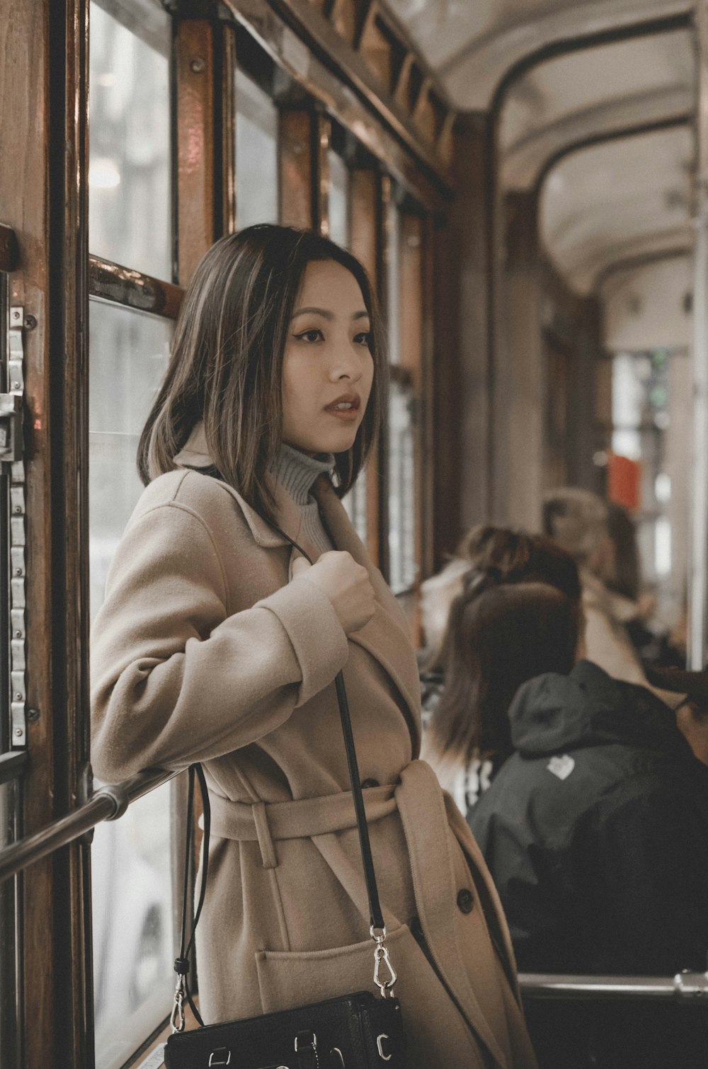 woman wearing trench coat