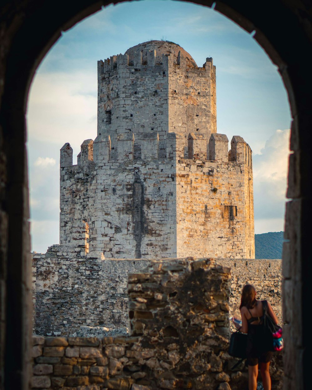 woman standing near castle