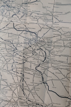 A detailed black and white map showing a network of roads and locations around Moscow. The map includes various city names such as Smolensk, Kursk, and Voronezh, with distinctive lines representing highways and railways.