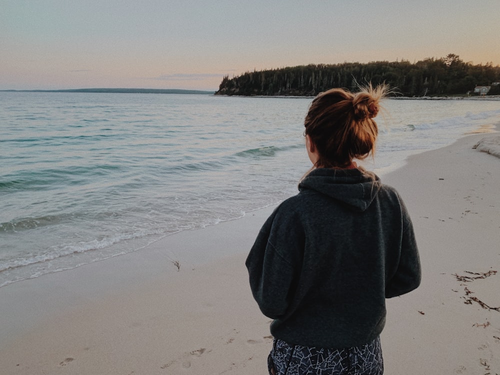 woman standing on the seashore