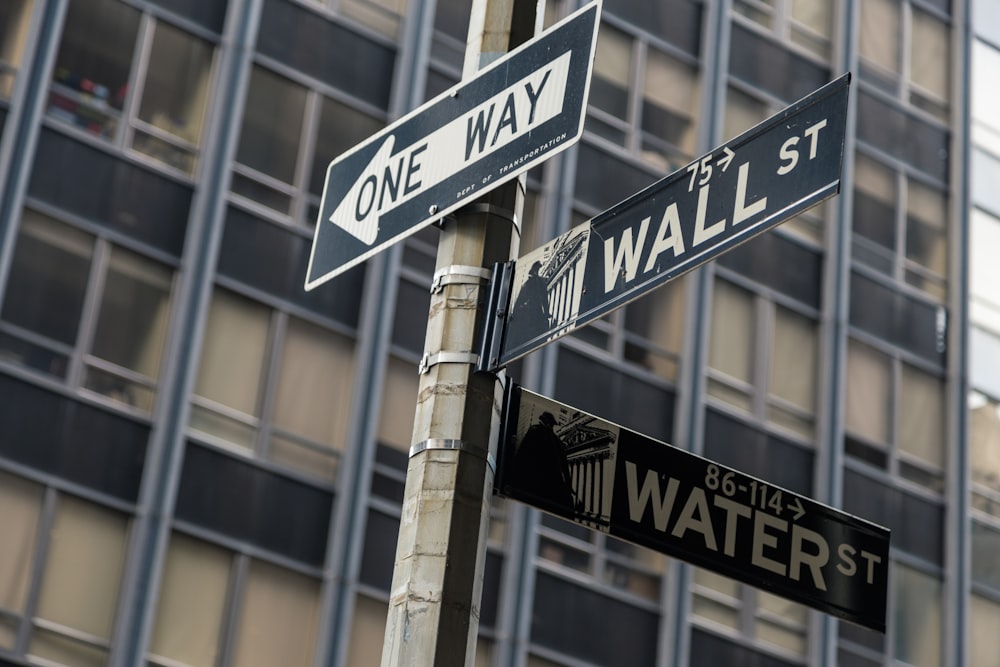 three blue and white signages