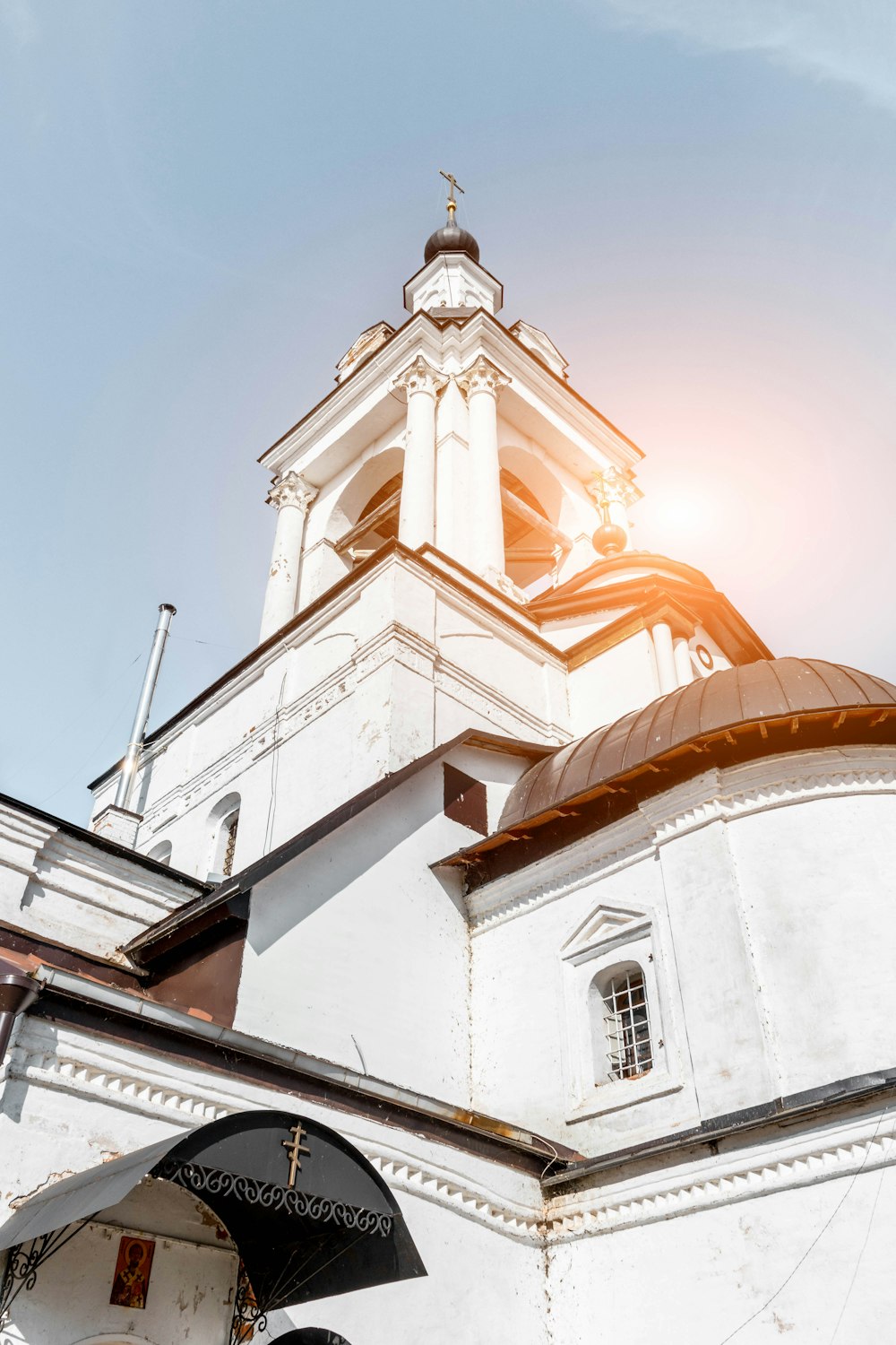 white and brown cathedral under blue sky