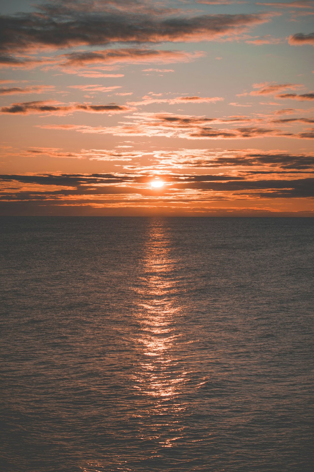 body of water during golden hour