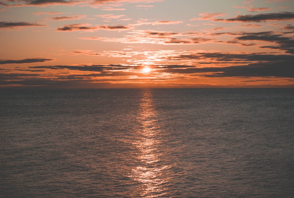 calm sea during golden hour