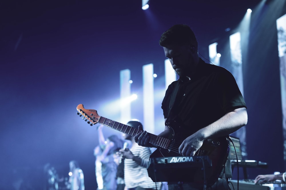 man playing guitar