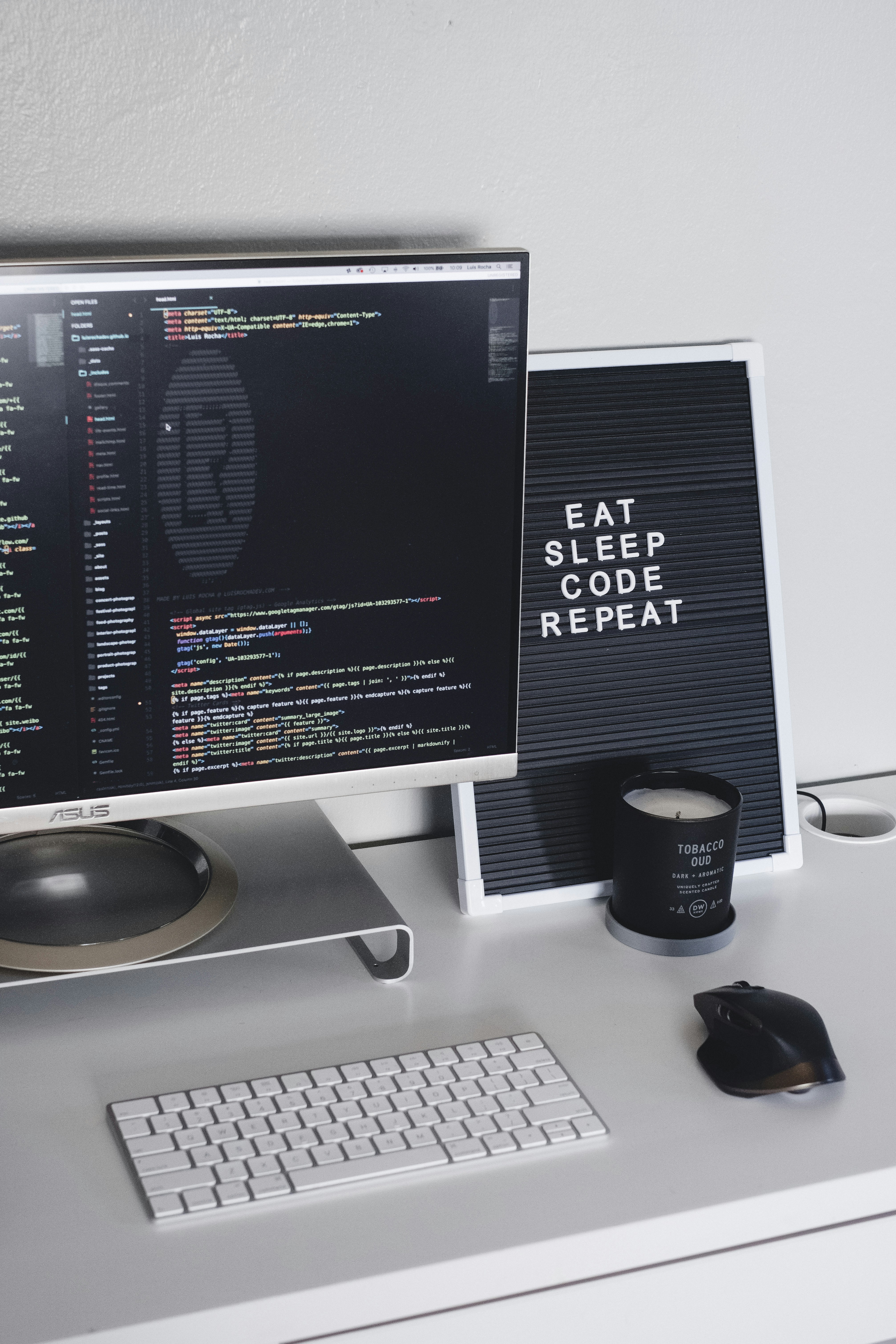 Person Sitting On Chair In Front Turned On Monitor Photo Free
