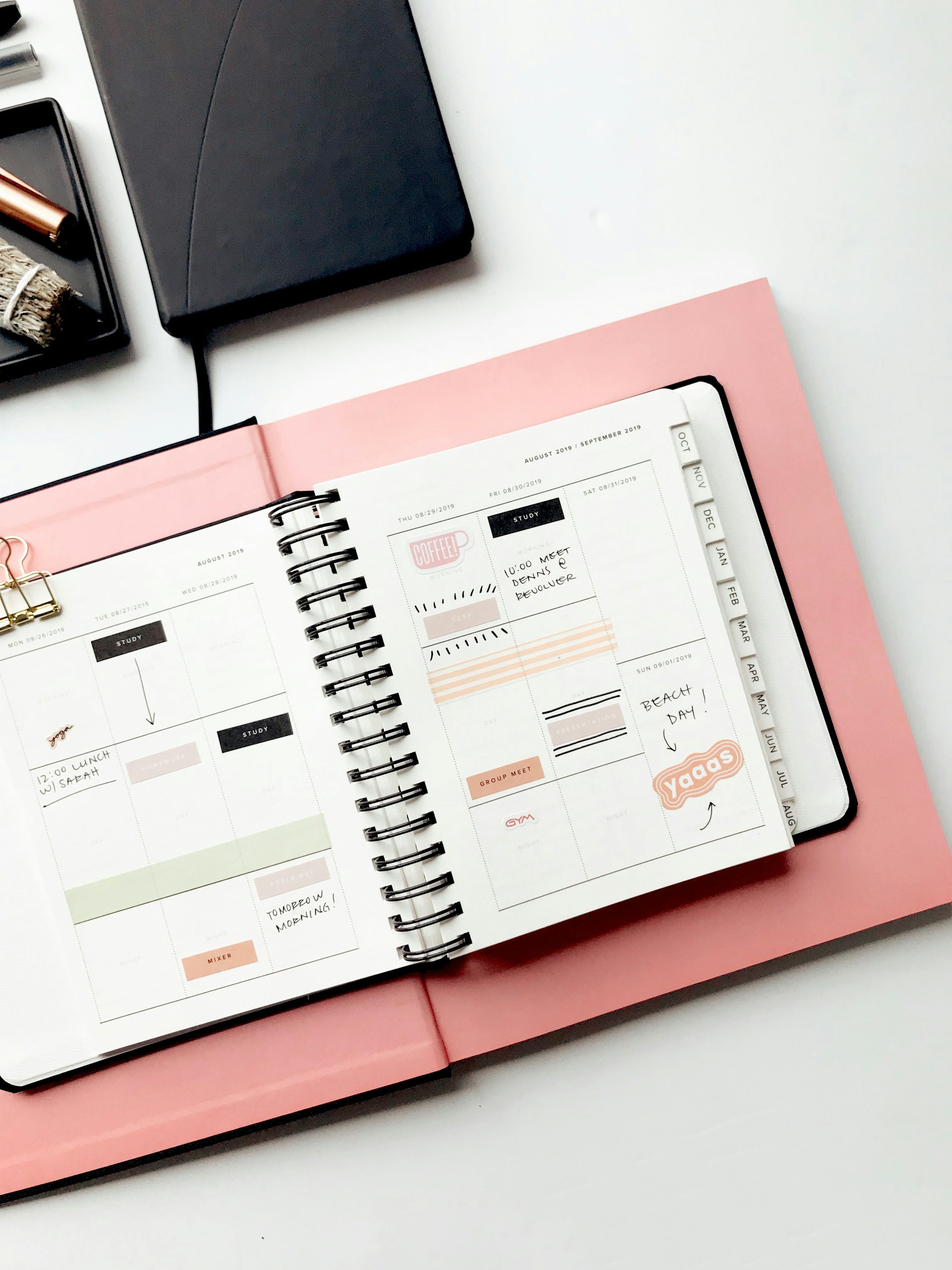 white spiral notebook