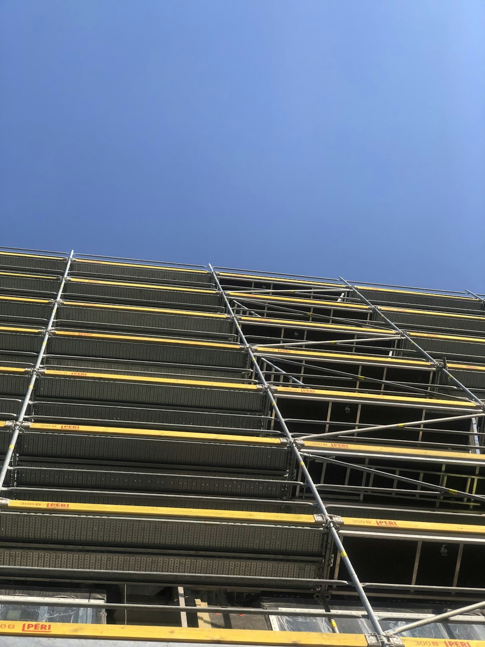 low angle photography of scaffolding